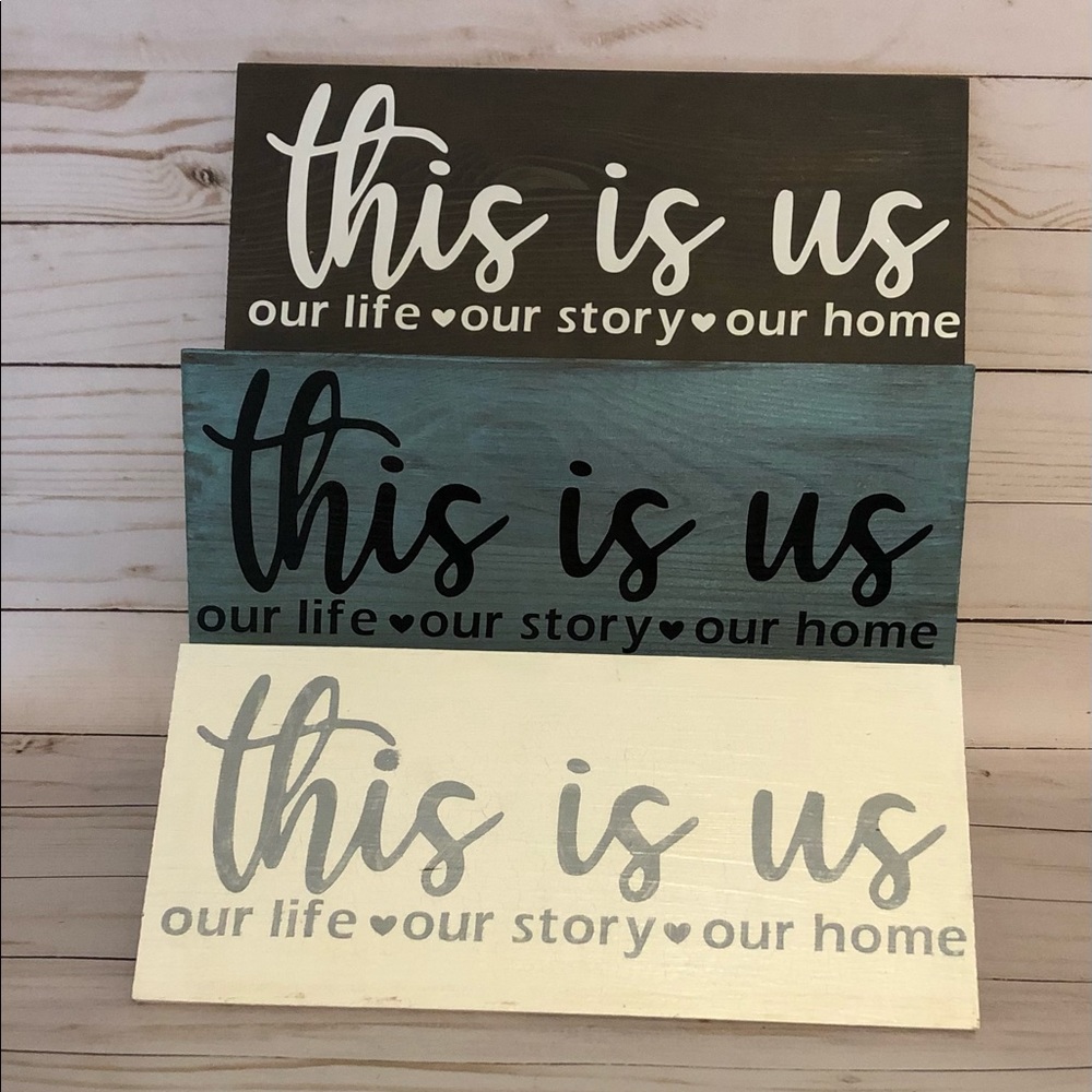 Hanging wood signs 12”X5”.